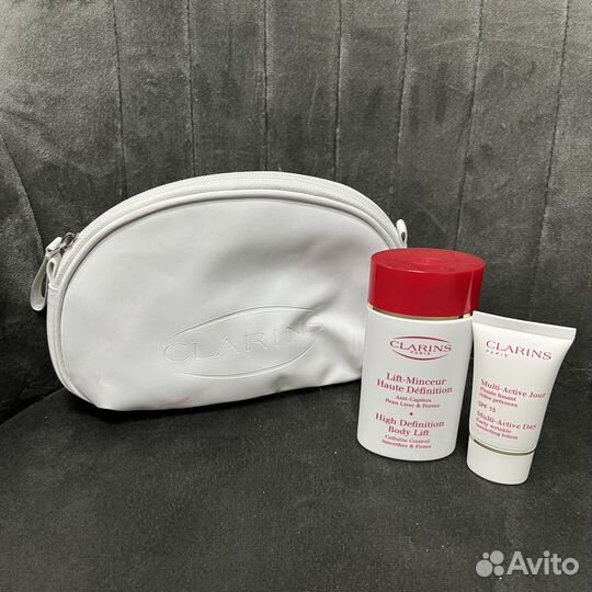 Clarins косметичка белая лаковая + уход