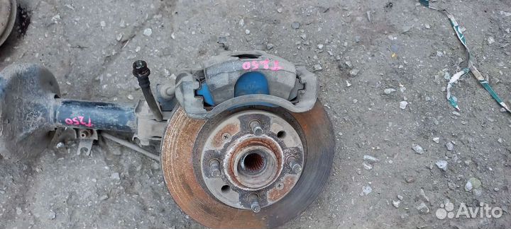 Суппорт тормозной передний Chevrolet Aveo T250