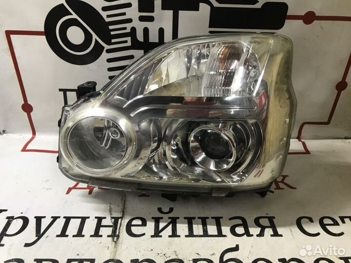 Фара левая Nissan X-Trail II (2007—2011)