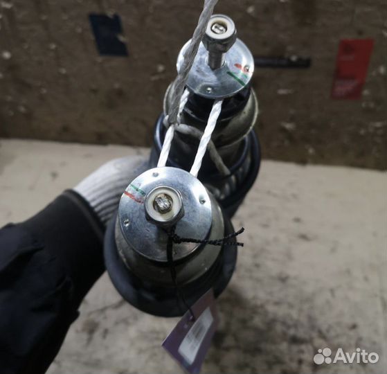 Стойка амортизатора mitsubishi mirage a05a