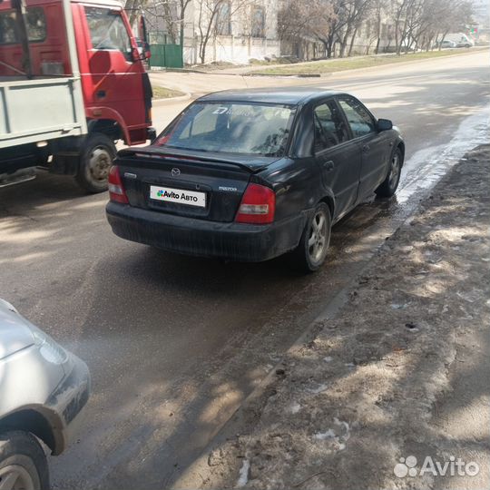 Mazda Protege 2.0 МТ, 2001, 307 992 км
