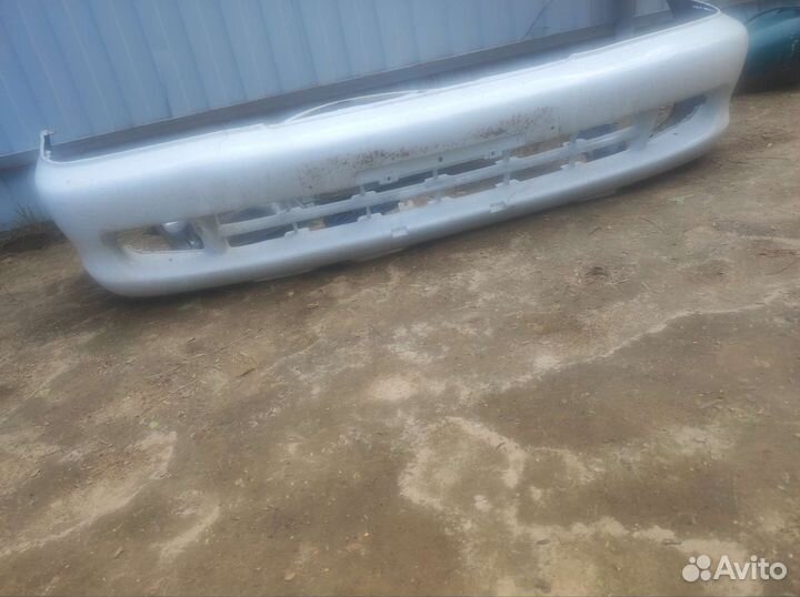 Бампер тойота королла ае 100