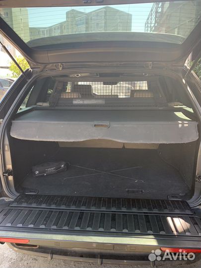 Шторка багажника е53