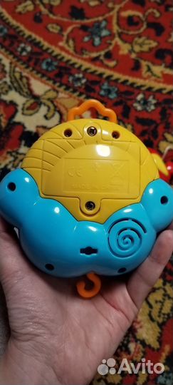 Детский мобиль в кроватку музыкальный