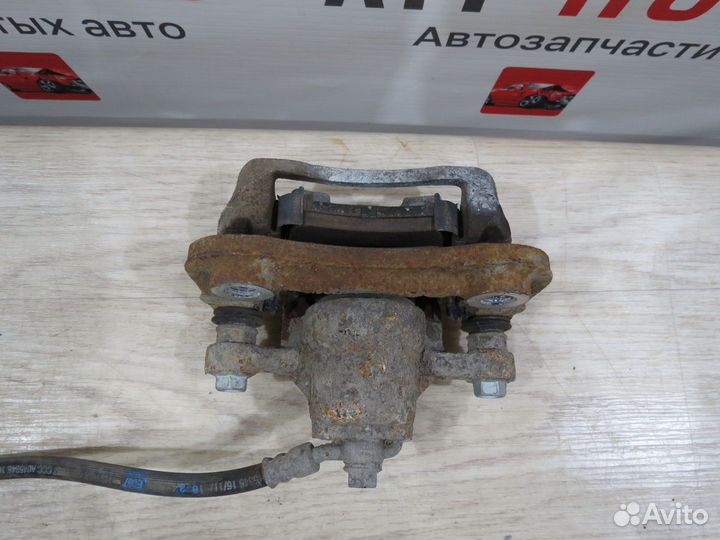 Суппорт тормозной задний правый Kia Optima 4