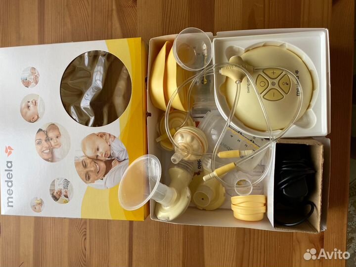 Молокоотсос Medela SwingMaxi электрический двойной