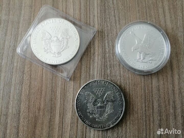 Американский орел серебряные монеты разных годов