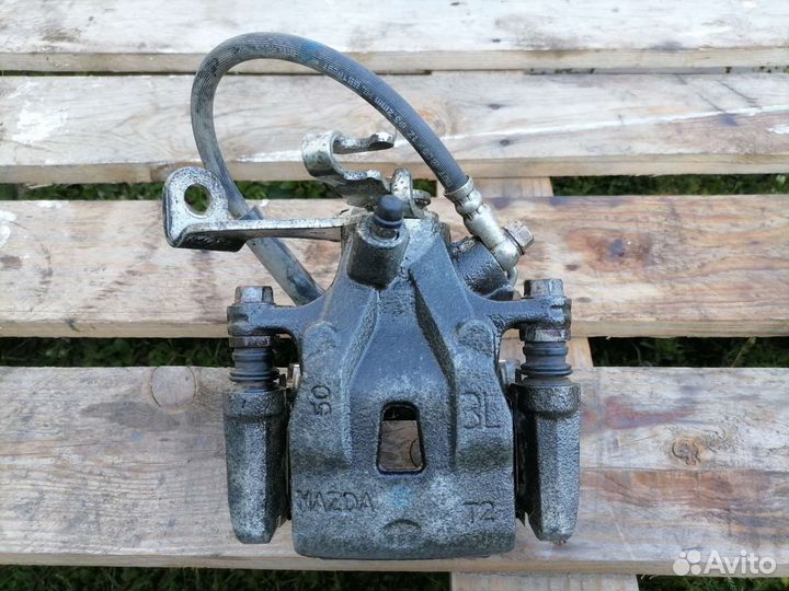 Задний тормозной суппорт мазда CX-5
