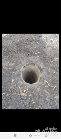 Бурение ям под столбы для забора