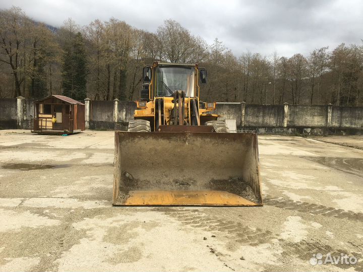 Услуги экскаватора и погрузчика