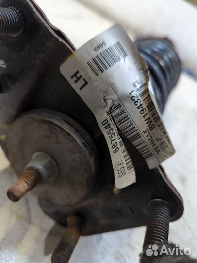 Амортизатор подвески левый передний Jeep Liberty