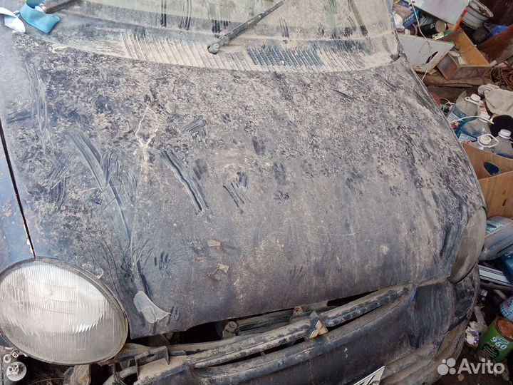 Капот митсубиси миника 1997года