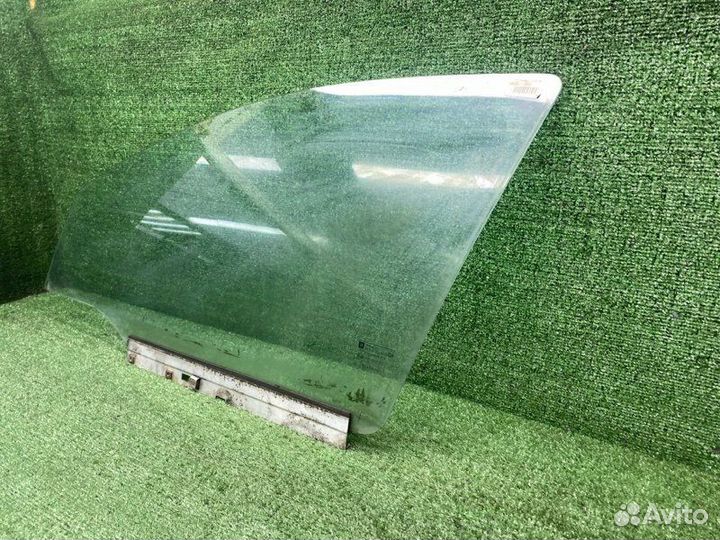 Стекло двери переднее левое Opel Astra G