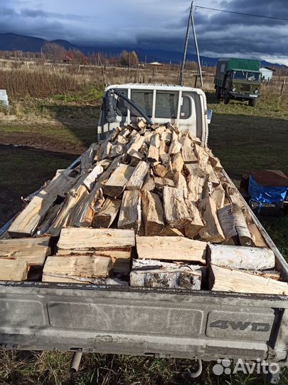 Дрова березовые колотые в мешках и кубами