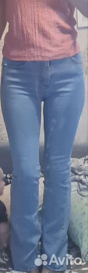 Джинсы клеш