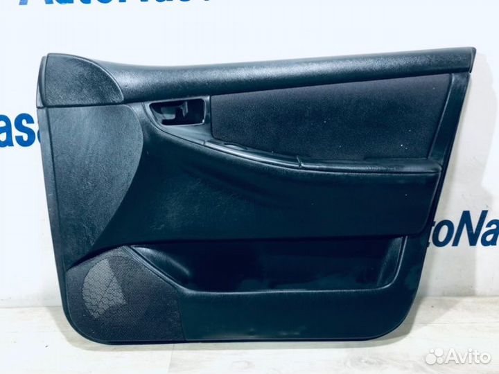 Обшивка двери передняя правая Toyota Corolla E12