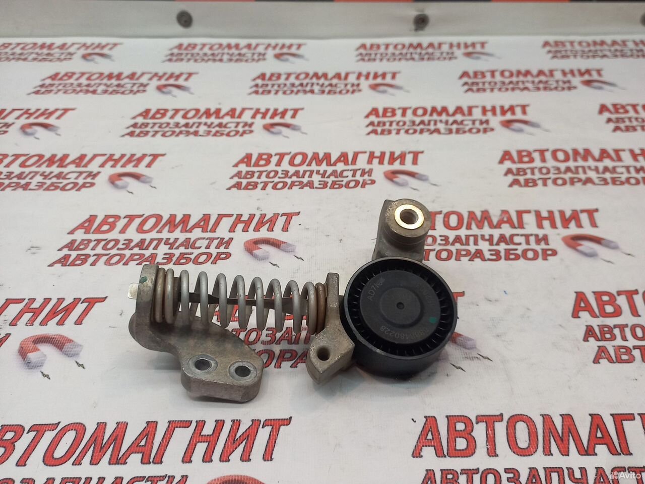 Натяжитель ремня ролик Джили Тугелла