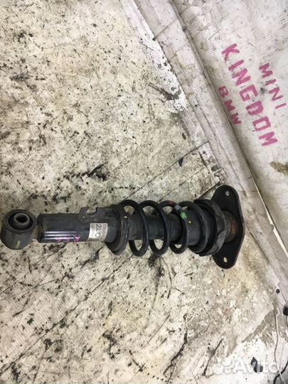 Стойка амортизатора задняя левая Mini Clubman