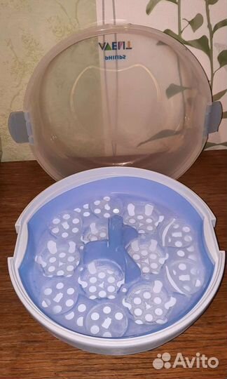 Молокоотсос, бутылочки, стерилизатор