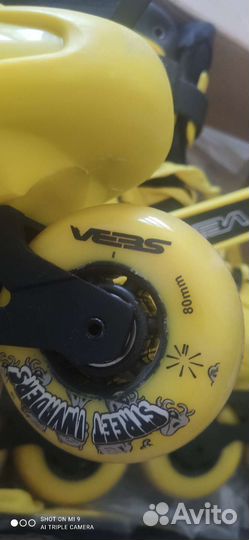 Роликовые коньки