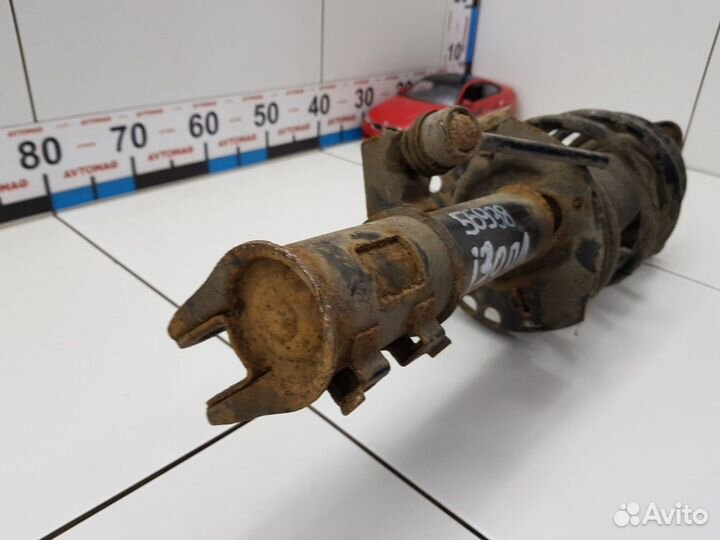 Амортизатор передний левый с пружиной