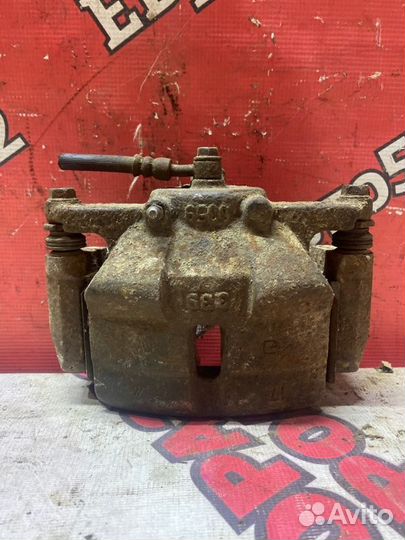 Суппорт тормозной передний правый Nissan X-Trail