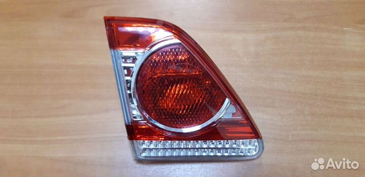 Фонари в крышку багажника Тойота Королла Е150 06-1