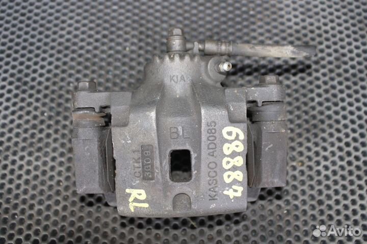 Суппорт тормозной задний левый Kia Sorento BL D4CB