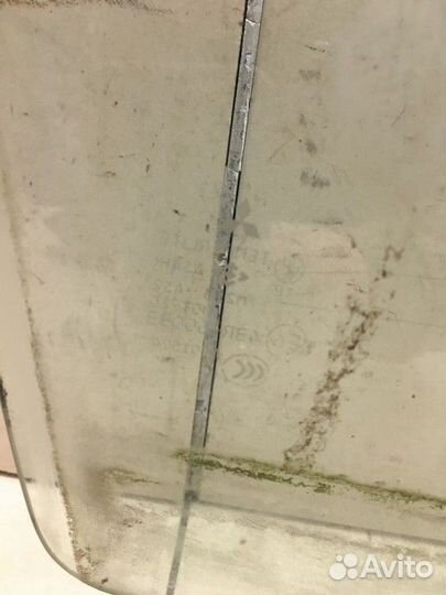 Стекло двери передней правой Mitsubishi Lancer