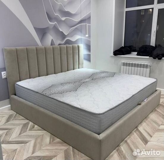 Кровать с подъемным механизмом