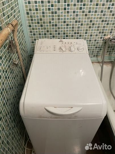 Стиральная вертикальной загрузкой