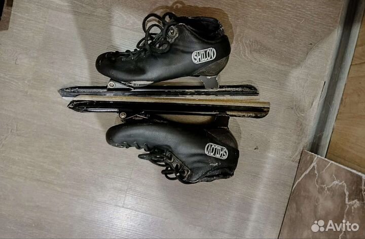 Конькобежные коньки клапы