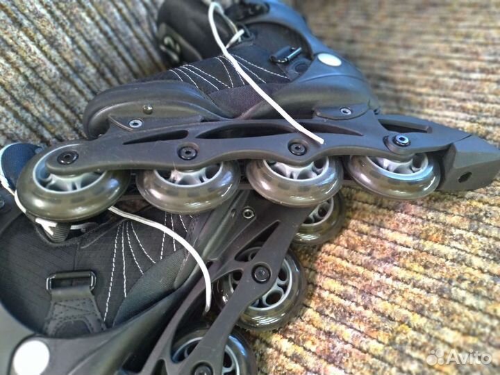 Роликовые коньки