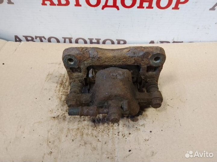 Суппорт тормозной задний левый Hyundai Santa Fe