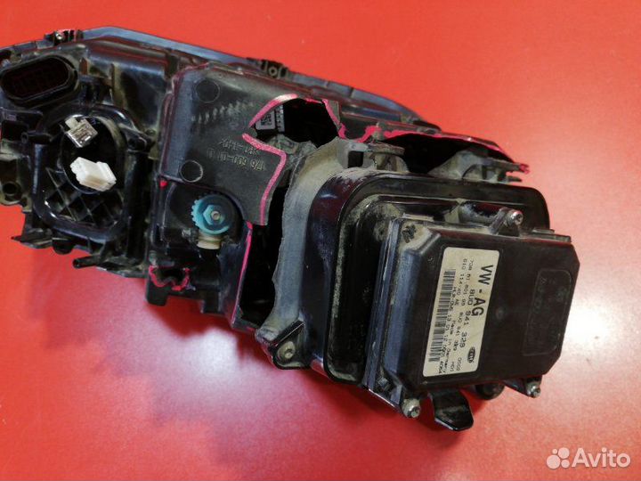 Фара левая Volkswagen Touareg