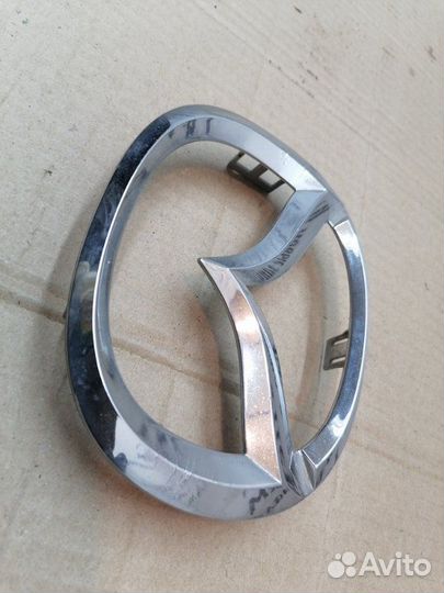 Эмблема передняя Mazda 6 GH 2008