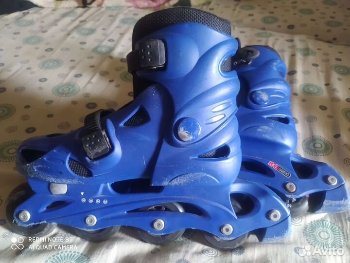 Роликовые коньки