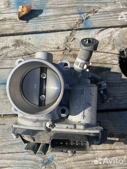 Дроссельная заслонка Мицубиси Лансер 10