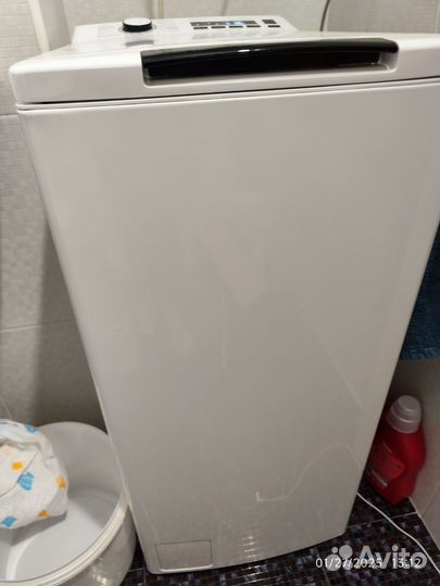 Стиральная машина с вертикальной загрузкой