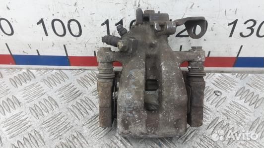 Суппорт тормозной задний левый opel astra H (KML24