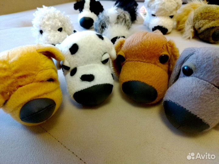 Коллекция игрушек собак