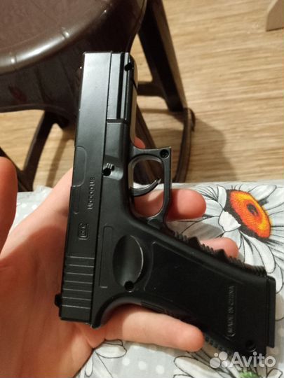 Игрушечный пистолет