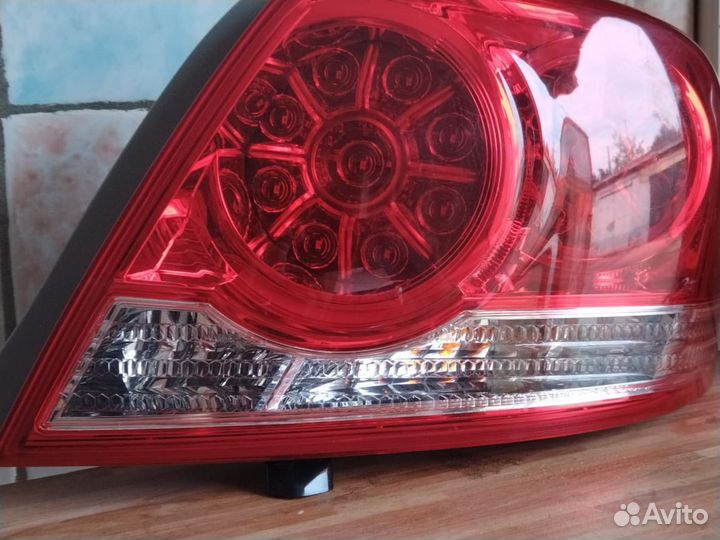 Фара toyota allion 260