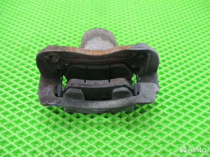 Суппорт передний левый Kia Rio 3 (UB\QB)