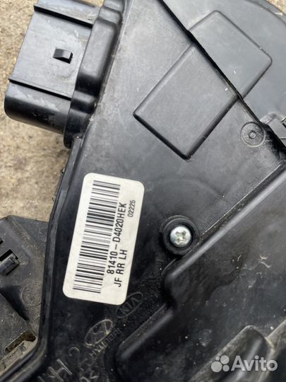 Замок задней левой двери Kia Optima