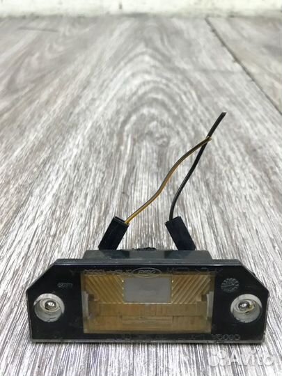 Фонарь подсветки номера задний Ford Focus 2