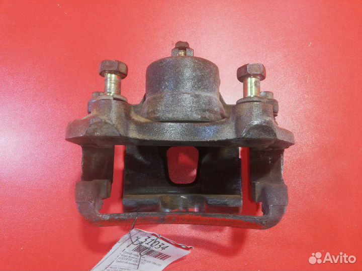 Суппорт передний правый Nissan Bluebird EU14