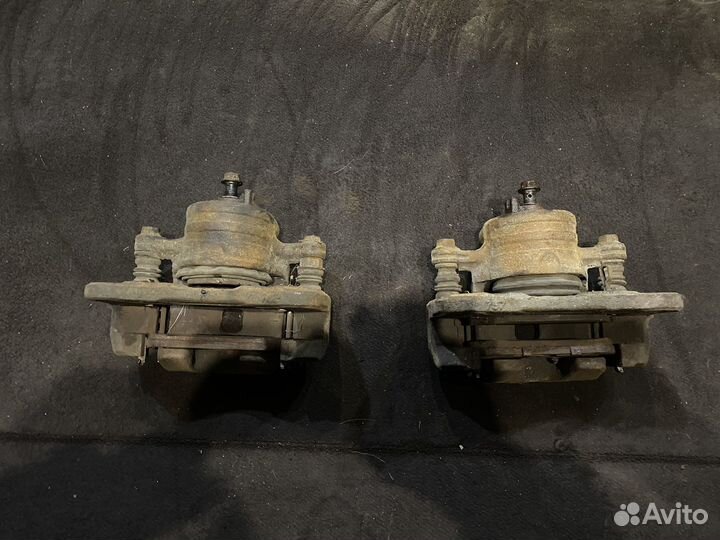 Передний суппорт Nissan Almera N15