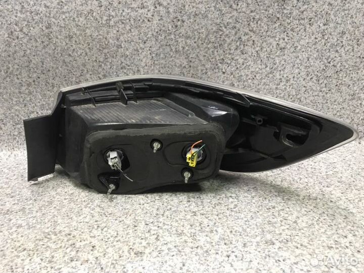 Фонарь левый Mazda 3 BL 2010