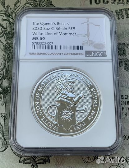 2 унции серебра 2020 года Английский лев в слабе